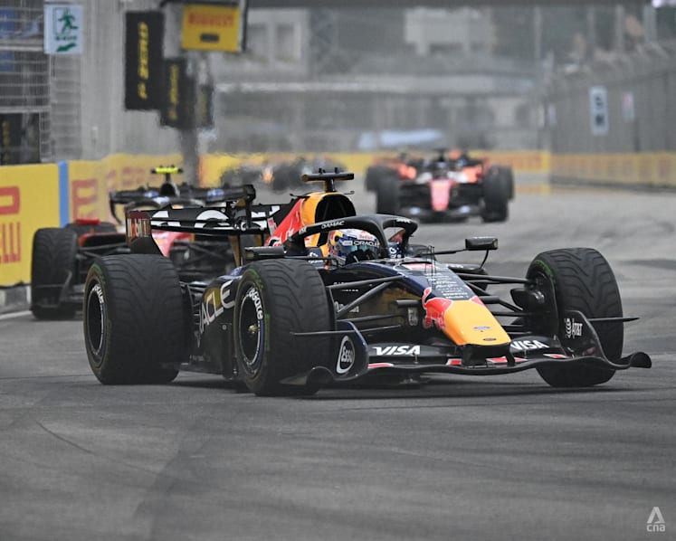 Motor racing-Verstappen wins Singapore sprint after chaotic start in wet conditions